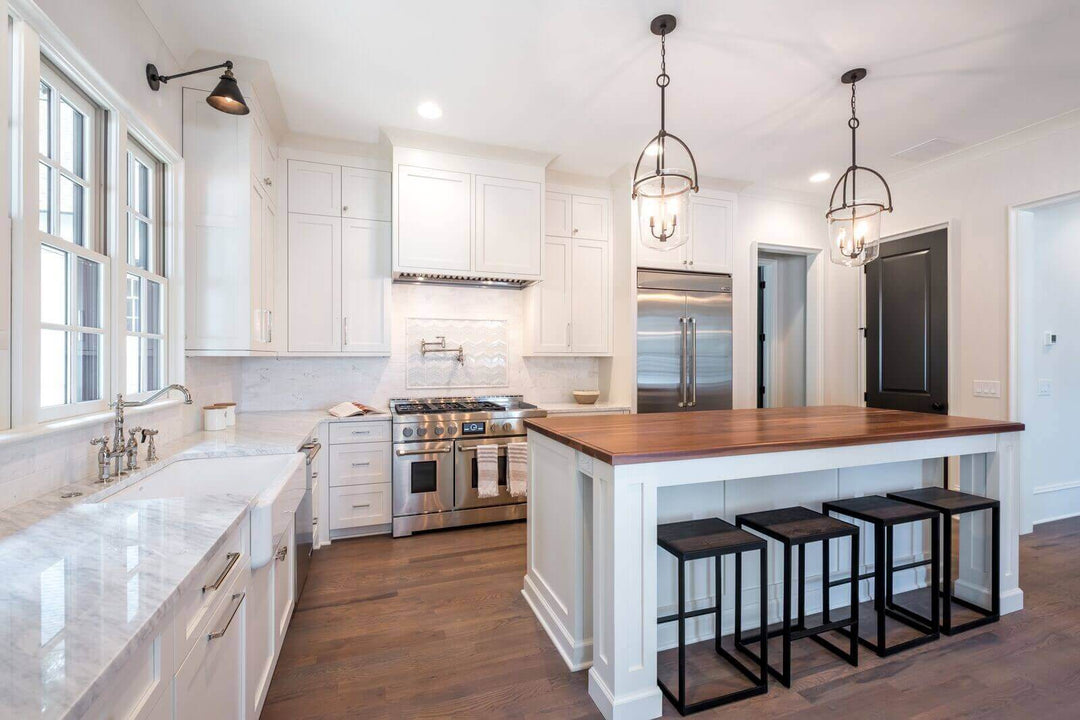Kitchen features white oak flooring finished with Rubio Monocoat.
