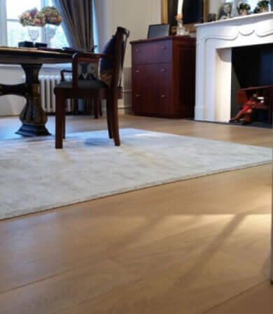 An oak floor with a natural wood finish.