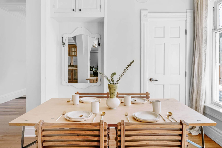 Birch wood dining table in a light room.