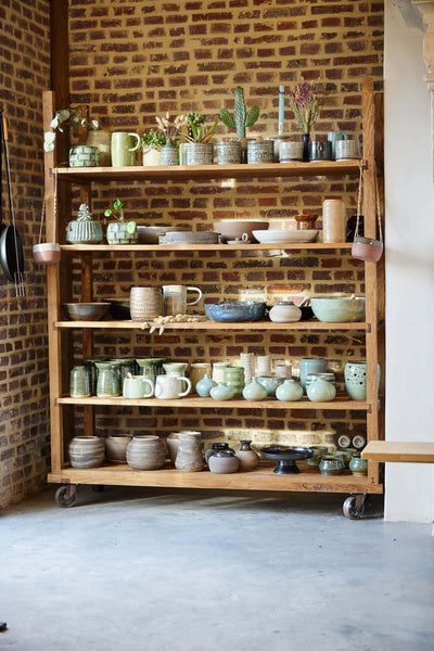 Rustic oak shelving handcrafted using traditional wood joinery methods.