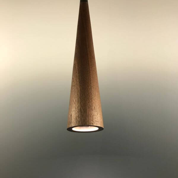 Lavaro lighting pendant made from Walnut wood.