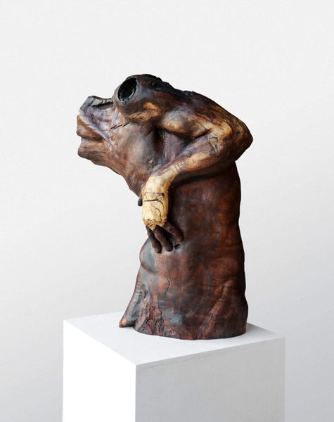 Rubio Monocoat Oil Plus 2C used to finished wooden sculpture of a torso.