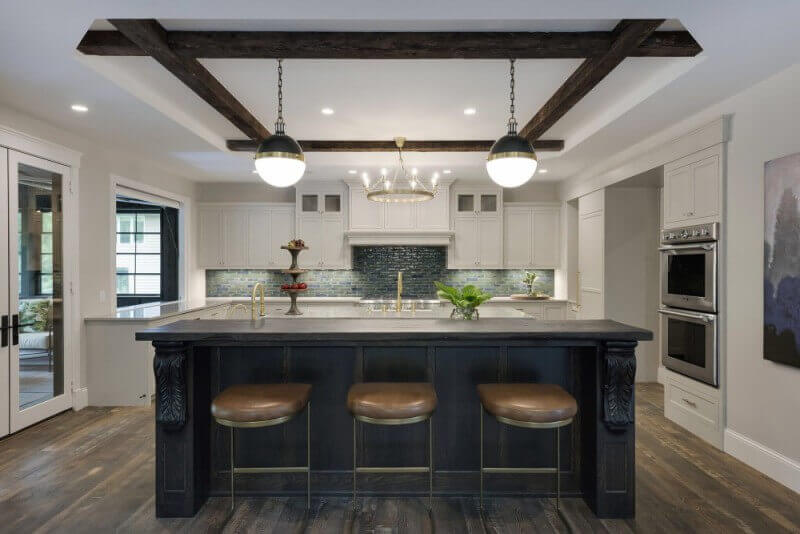 Kitchen island matches with red oak hardwood flooring finished with Rubio Monocoat.