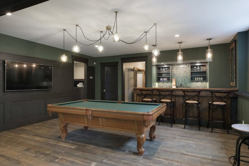 Billiards room with wood flooring finished with Rubio Monocoat.