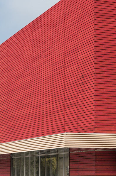 Library features exterior wood cladding finished with Rubio Monocoat.