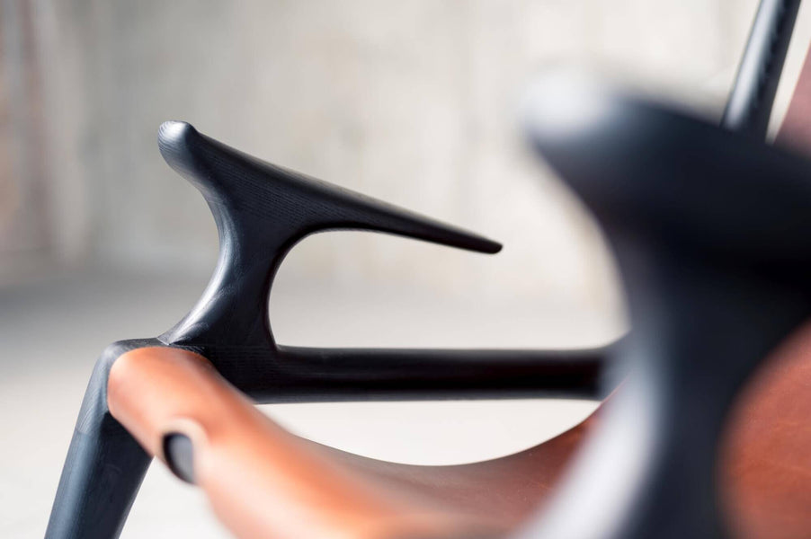 Wood chair arm details by Fernweh Woodworking.