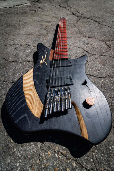 Matte electric guitar wood finish.