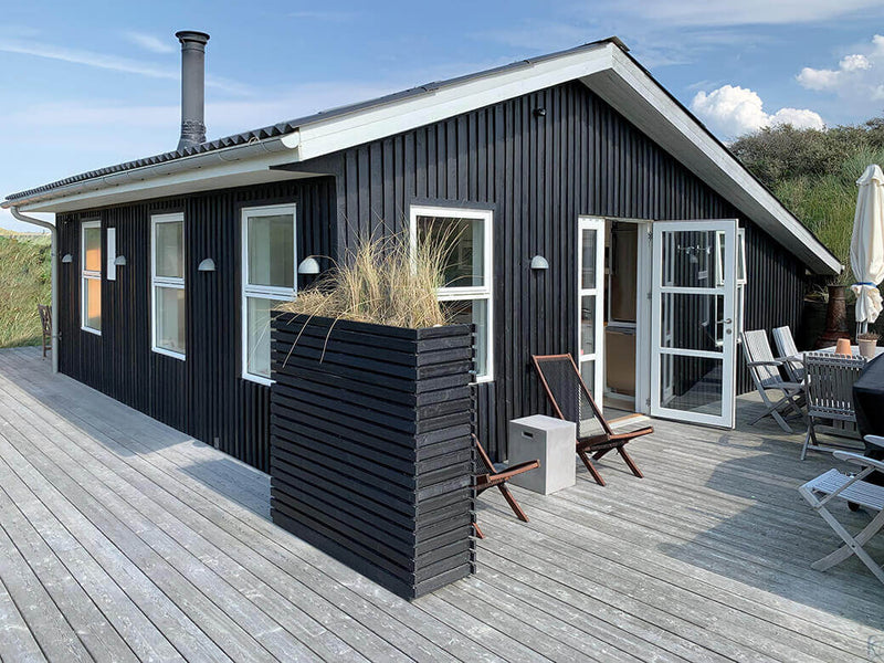 Beach house with wooden exterior finished with Rubio WoodCream.