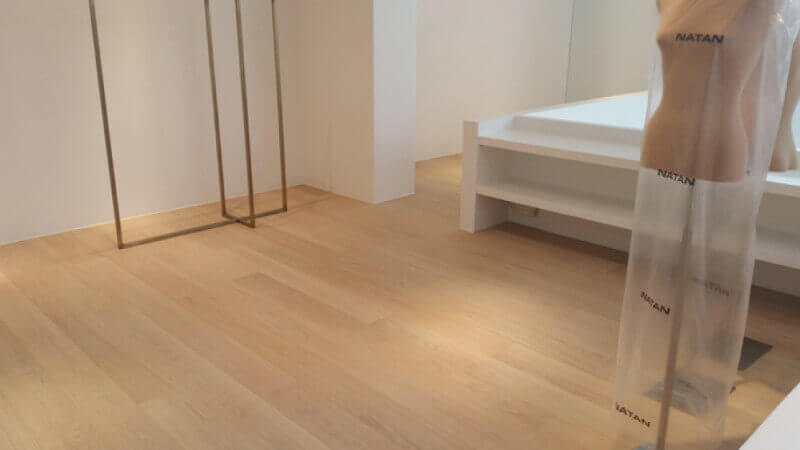 Clothing boutique in Brussels features oak wood flooring finished with Rubio Monocoat.