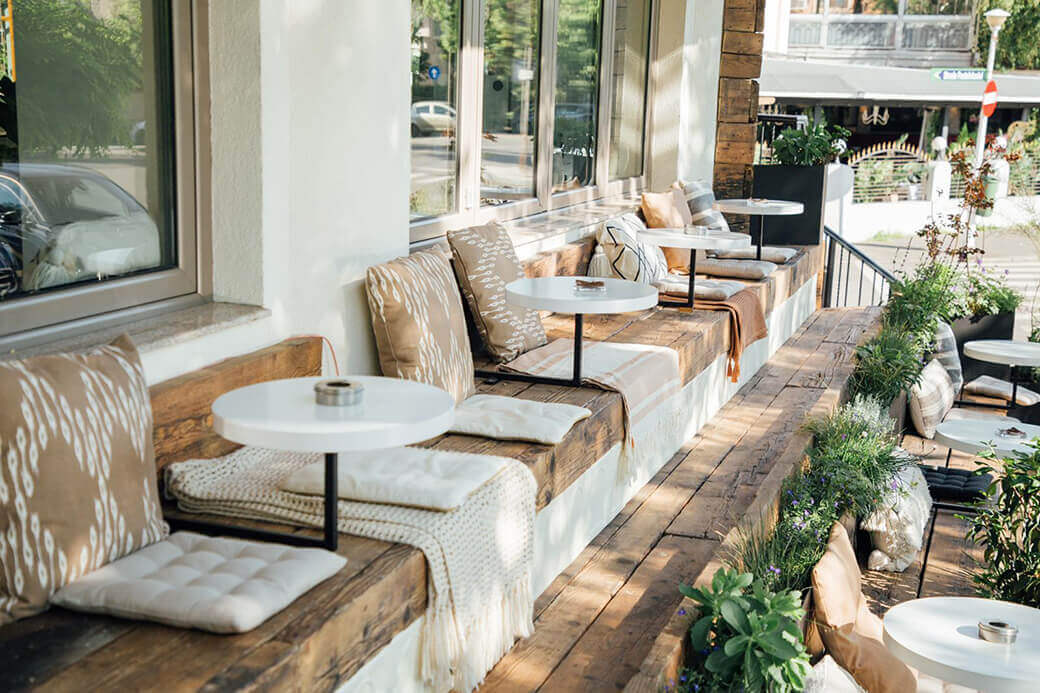 Wood boards on restaurant patio finished with wood oil.